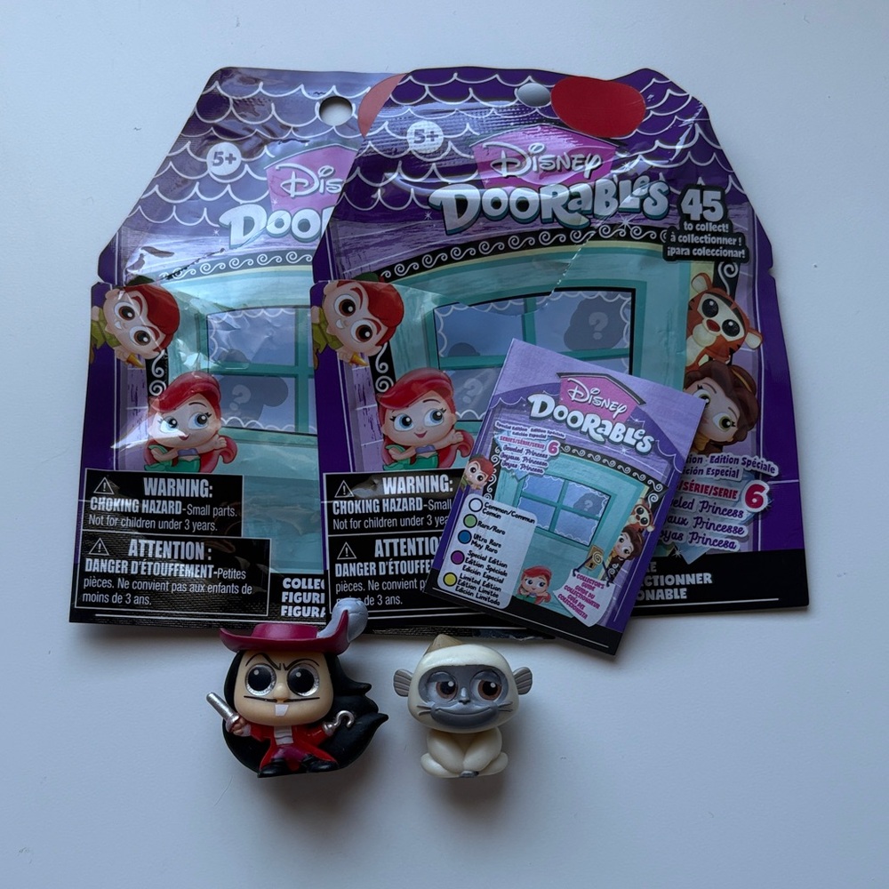 Disney Doorables Collectible Figures - Pan and Captain Hook